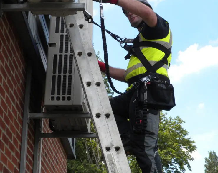 Worker wearing Ladder Safety Fall Protection Kit