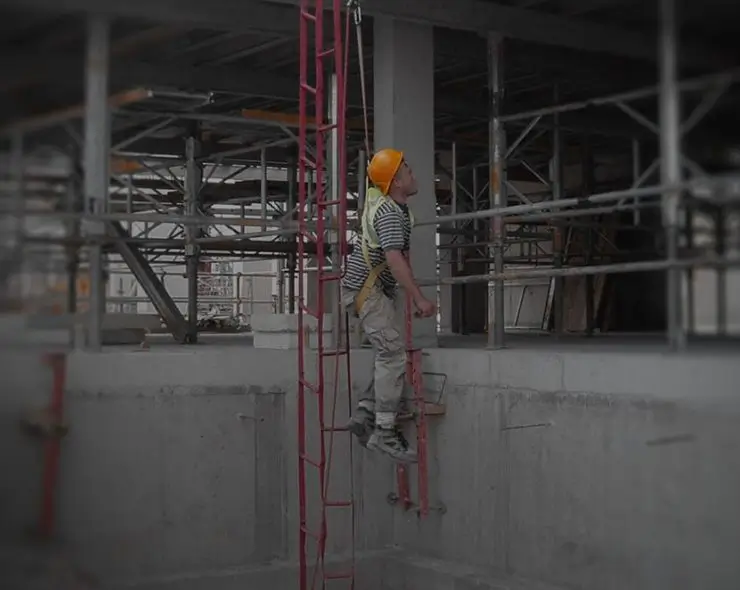Construction worker completing height rescue training course