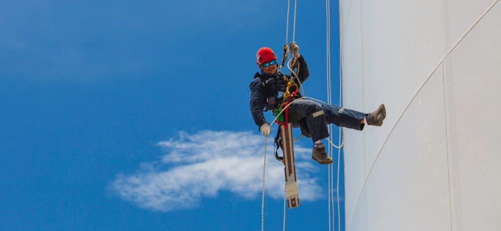 Male working safely at height