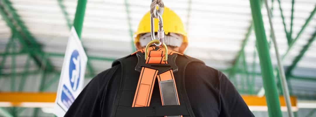Height safety training - male wearing harness